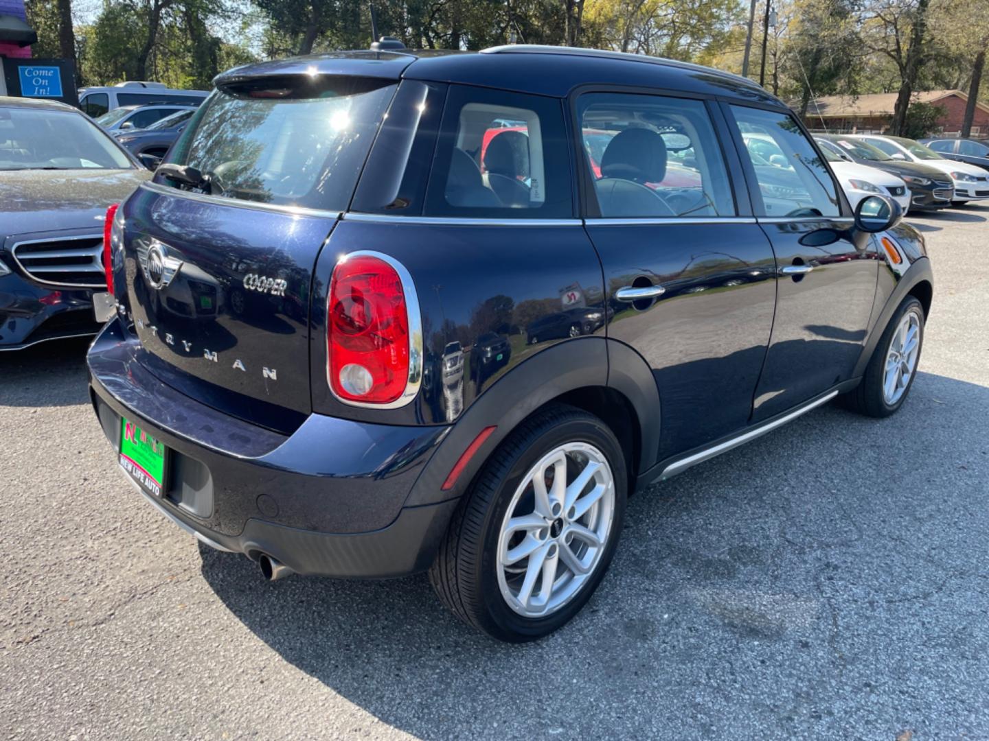 2015 BLUE MINI COUNTRYMAN COOPER (WMWZB3C55FW) with an 1.6L engine, Automatic transmission, located at 5103 Dorchester Rd., Charleston, SC, 29418-5607, (843) 767-1122, 36.245171, -115.228050 - Photo#6